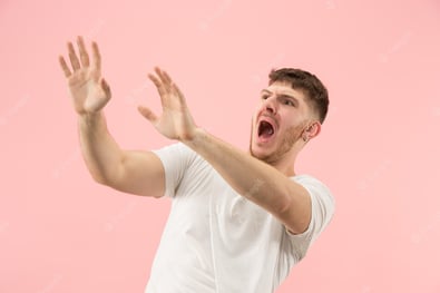 i-m-afraid-fright-portrait-scared-man-business-man-standing-isolated-trendy-pink-studio-background-male-half-length-portrait-human-emotions-facial-expression-concept_155003-17488