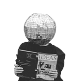 Black & white image of a male with a disco ball on head