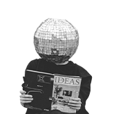 Black & white image of a male with a disco ball on head