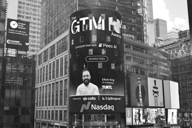 Elliott King on the Nasdaq board in Time’s Square